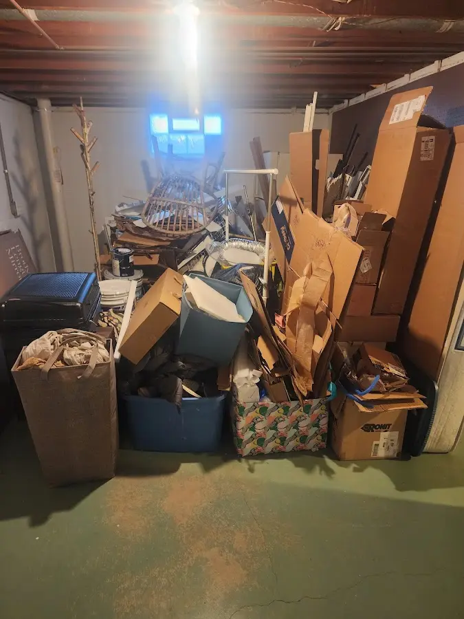 Roll-off dumpster container at job site for Construction Dumpster Rental in Camden